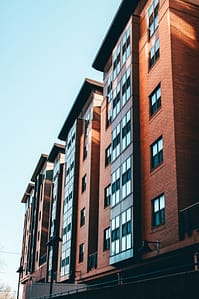What are the roles in a real estate syndication